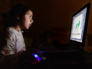 Young girl on computer