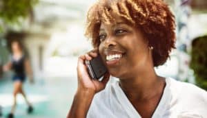 Woman smiling during phone call