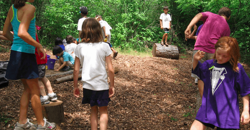 Kids playing in woods