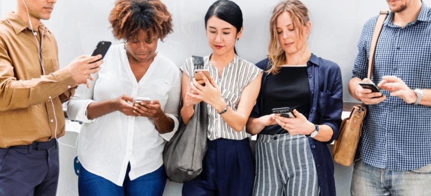 Group of adults all on their phones